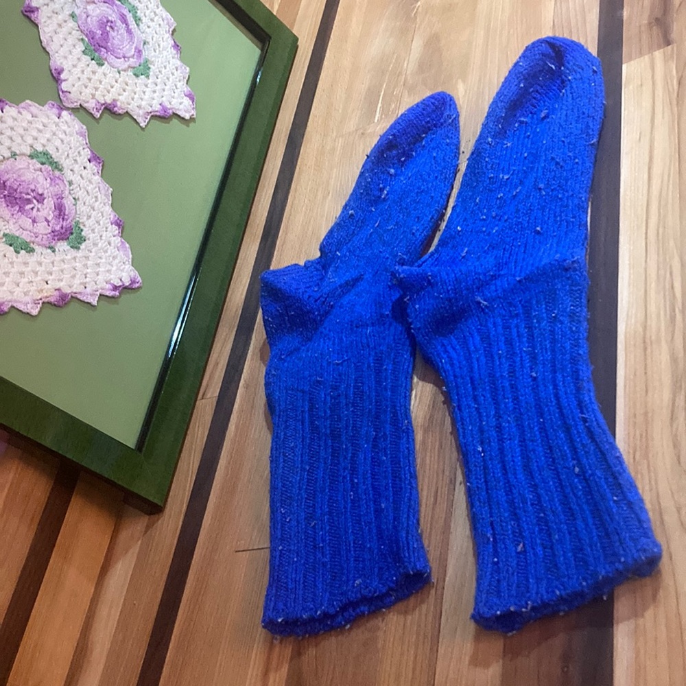 Blue 100% wool socks length Toe to heel 8 in heel to cuff 10 in.  Good & warm!